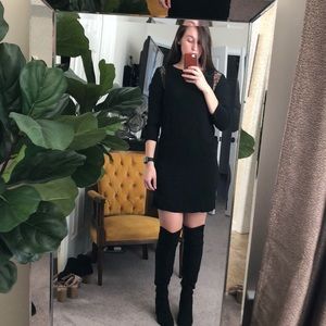 Black dress with peekaboo lace sleeve